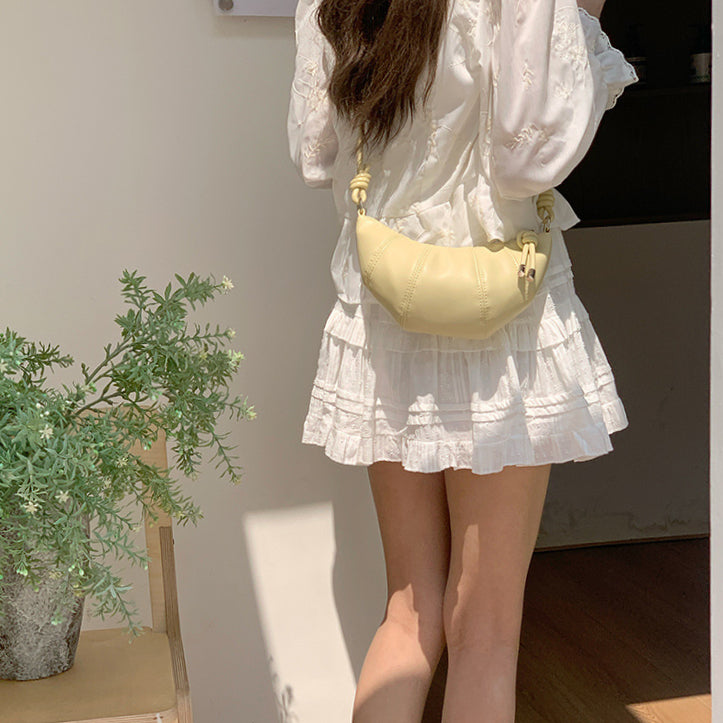 日韓流行 | 韓國小眾設計包包女2025新款夏季簡約可頌牛角包百搭休閒斜背包「9574#」25.04-2