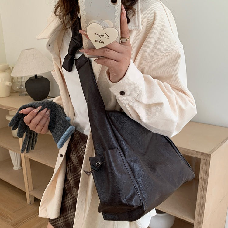 日韓流行|韓版大容量托特包女2025秋冬打結復古慵懶軟皮質感單肩斜挎包「D9042」25.11-1