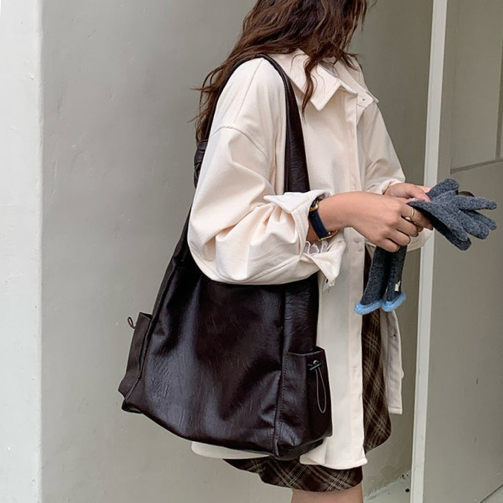 日韓流行|韓版大容量托特包女2025秋冬打結復古慵懶軟皮質感單肩斜挎包「D9042」25.11-1