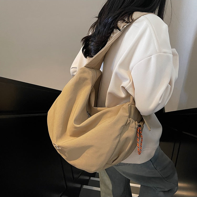 致青春 | 大容量餃子包包女2025新款潮流男女旅行包休閒通勤單肩斜挎包「2505-126」25.02-3