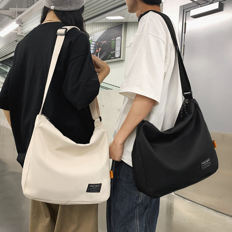 致青春 | 斜背包男ins潮牌2024新款大容量男士包包帆布郵差包女肩包日系「1834-120」24.05-2