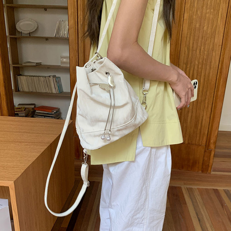 日韓流行|薄荷曼波綠雙肩包包女式2024新款韓國蝴蝶拉繩水桶包百搭ins單肩腋下包「9450#-2」24.08-1