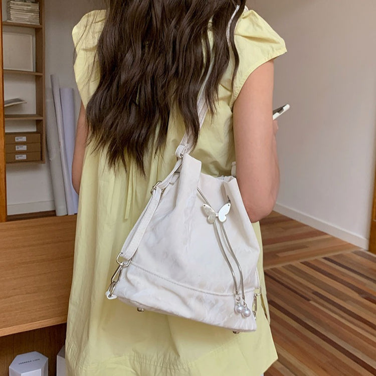日韓流行|薄荷曼波綠雙肩包包女式2024新款韓國蝴蝶拉繩水桶包百搭ins單肩腋下包「9450#-2」24.08-1