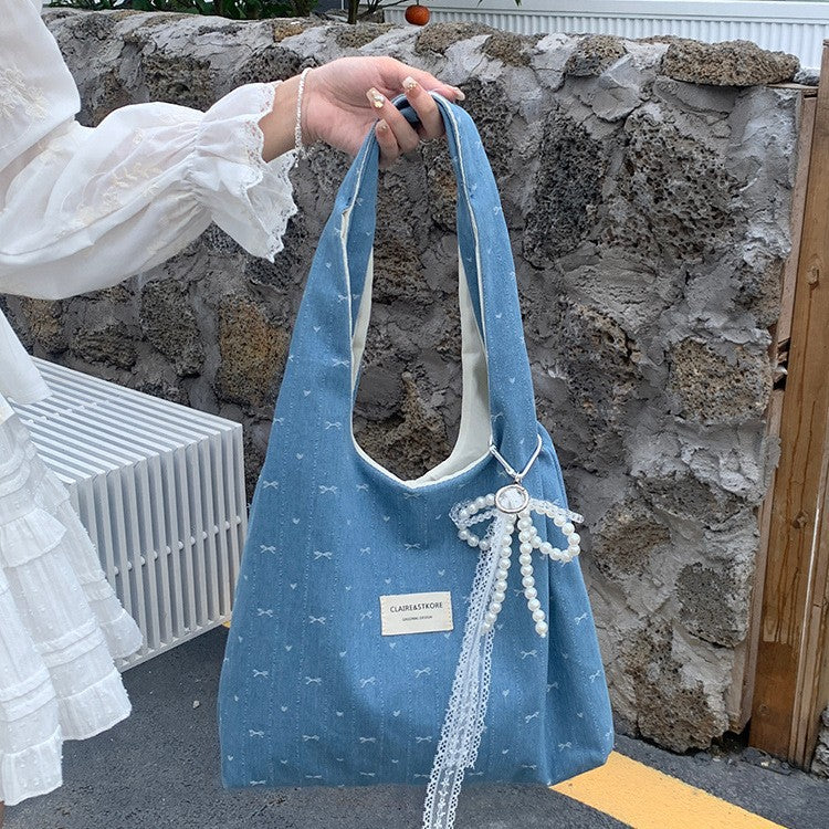 日韓流行|韓系牛仔藍色蝴蝶結帆布包包女款大容量慵懶鬆弛感通勤單肩托特包「M9009」25.06-4