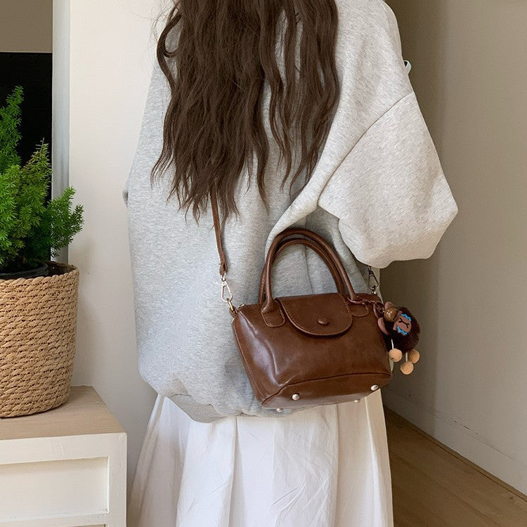 日韓流行|高級感小眾超火包包女式2025新款洋氣百搭復古時尚手提上班通勤包「9558#」25.03-4