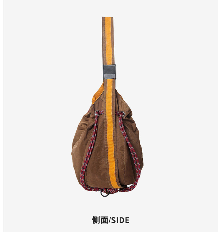 致青春|防潑水撞色休閒拼接慵懶風布包包簡約抽繩刺繡字母單肩斜挎包「9025-131」25.09-3