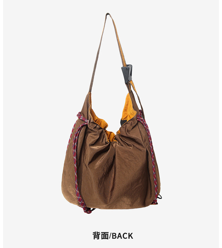 致青春|防潑水撞色休閒拼接慵懶風布包包簡約抽繩刺繡字母單肩斜挎包「9025-131」25.09-3