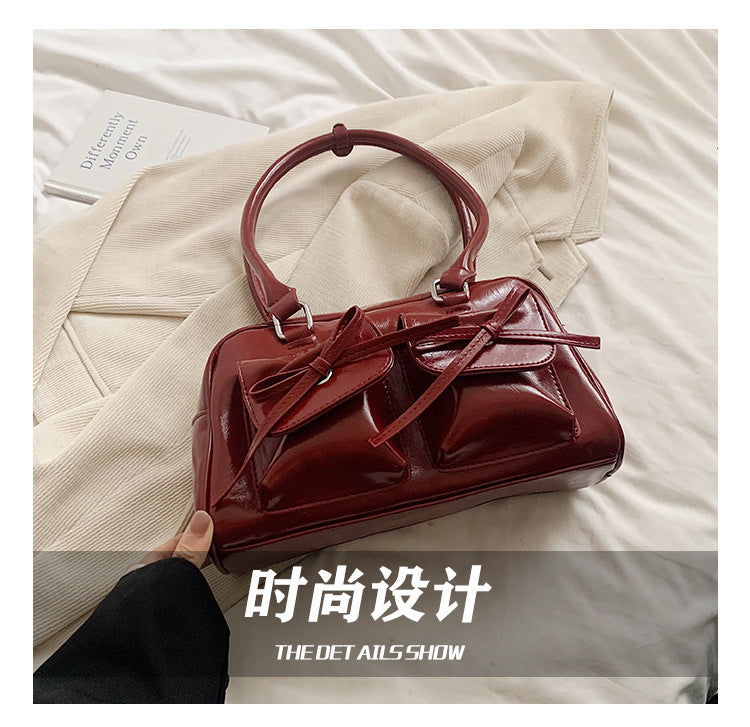 日韓流行 | 褶皺蝴蝶結單肩腋下包包女2024新款手提枕頭包保齡球包時尚通勤包「9497#」24.11-3