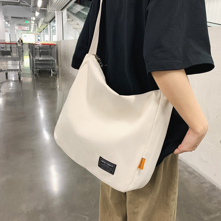致青春 | 斜背包男ins潮牌2024新款大容量男士包包帆布郵差包女肩包日系「1834-120」24.05-2