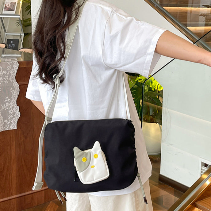 致青春|可愛貓咪斜背包卡通休閒韓版輕便小背包大容量設計感通勤單肩包「909-123」25.06-2