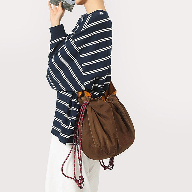 致青春|防潑水撞色休閒拼接慵懶風布包包簡約抽繩刺繡字母單肩斜挎包「9025-131」25.09-3